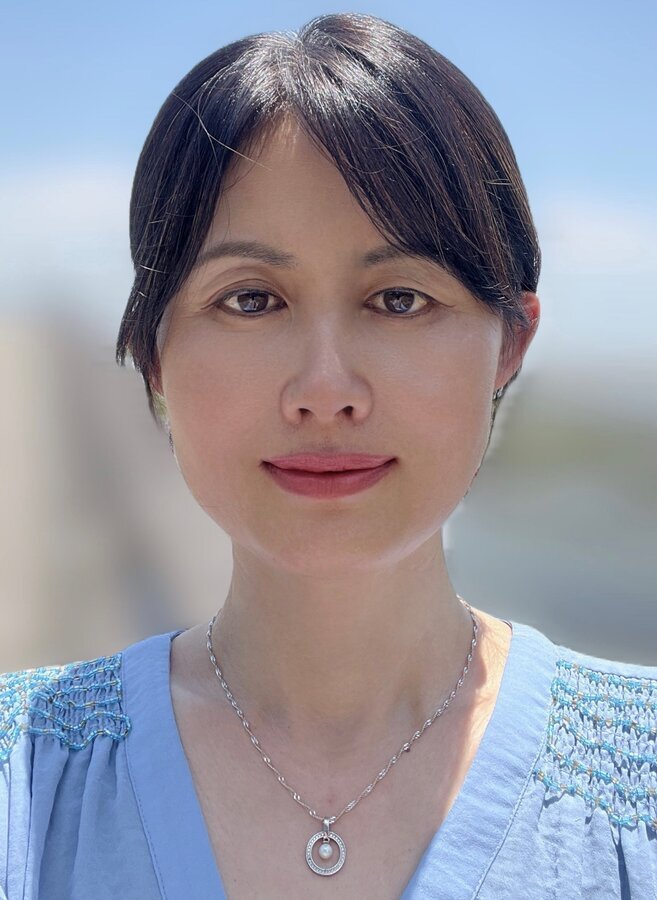 Real Estate Agent Tan XiuRong